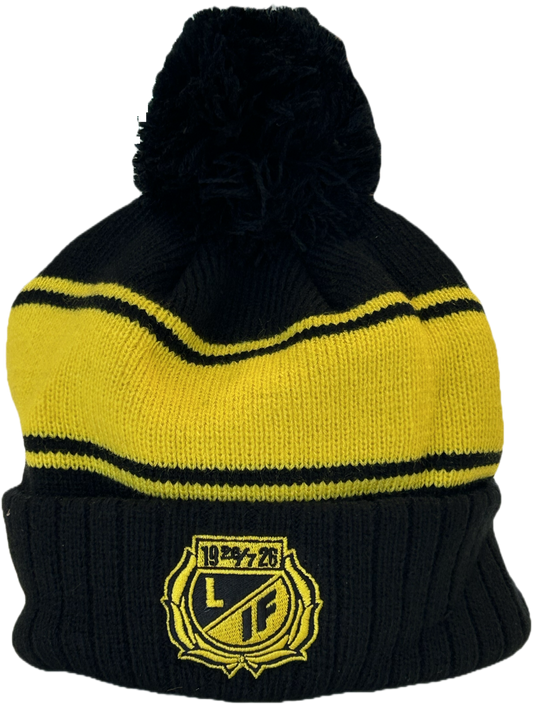 Stickad tofsmössa med gul logga och gula ränder